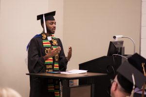 Jamal Moss giving graduation remarks