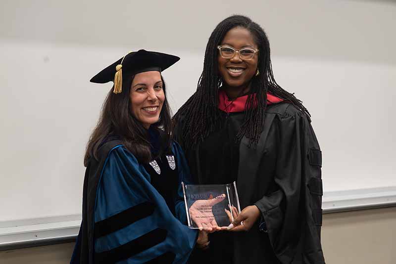 Dr. Nia Johnson receives the 2023 Faculty and Staff Leadership Award